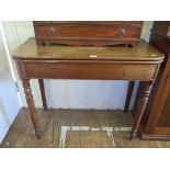 An early Victorian mahogany foldover tea table with broad frieze on ring turned tapering legs 91cm