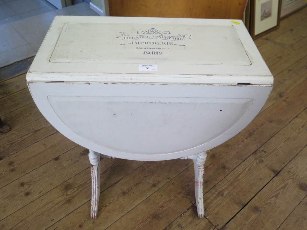 A painted drop flap occasional table,inscribed 2664 rue Halevy, Paris, 50cm wide