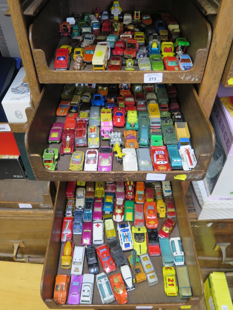 Various loose die-cast model cars, as found