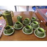 A Hornsea Heirloom pattern coffee service in green, with six coffee cups and saucers, coffee pot,