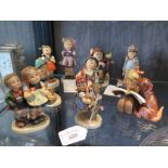 Nine Goebels figures of children designed by M.I. Hummel