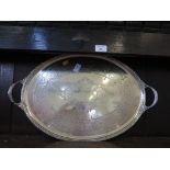 An Edwardian oval silver plated tray