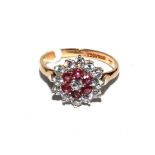 A 9 carat gold ring set with rubies and cubic zirconias