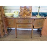 A George III style mahogany and satinwood crossbanded bowfront sideboard, the two central drawers