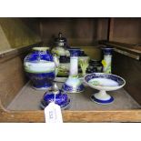 A Noritake dressing table set, with blue ground depicting landscapes (as found)
