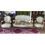 A 19th century French giltwood salon suite comprising a canape and two fauteuils, the rose carved
