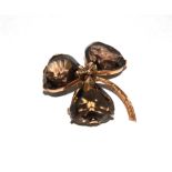 A clover leaf brooch in smokey quartz