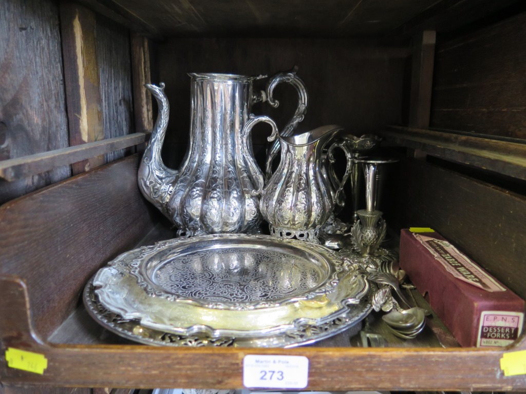 A collection of silver plate to include tea set, three waiters, etc