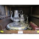 A collection of silver plate to include tea set, three waiters, etc