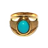 A turquoise set ring