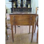 A 19th century mahogany side table, the hinged lid over two dummy drawers and a long drawer on