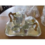 A Picquot ware four piece tea set and tray