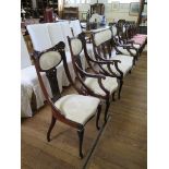 An Edwardian mahogany drawing room suite comprising two seat settee, two armchairs and two single