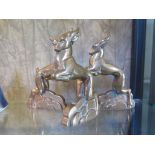 Three Art Deco bronze figures of jumping antelope, 16cm high