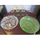 A green glass lily pattern bowl, 33cm diameter, another glass bowl, and a set of six wine glasses