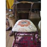 A late Victorian part ebonised mahogany bedroom chair, with fluted slightly outsplayed legs.