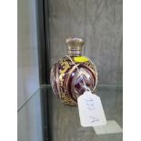 A Victorian ruby overlay glass perfume bottle, of globular form with silver cap, 11cm high