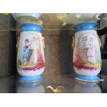 A pair of late 19th century French porcelain vases, with Sevres blue bands and painted with girls