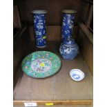 A pair of Chinese cylindrical blue and white prunus vases, 21cm high, a ginger jar similar, a