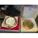 Two ladies boxed powder compacts