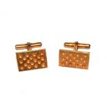 A pair of 14 carat gold cufflinks