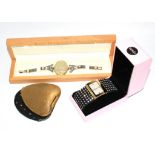 A ladies compact, a fashion watch and a silver and lucite bracelet