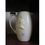 A Wedgwood commemorative jug, Keith Murray design with relief profiles of King George VI and Queen