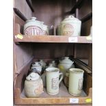 A collection of Cornish stoneware, tablewares and jars (two trays)