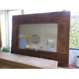 A large timber framed rustic wall mirror, rectangular, 106cm x 136cm