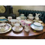 A collection of late 19th century and early 20th century china teacups and saucers, inclusding