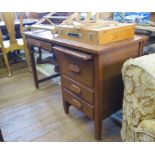 A mahogany desk, with slide and three drawers down one side and a drawer over the kneehole