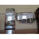 An Art Deco bevelled wall mirror, with crossbanded pediment and sunburst rays, 73cm x 38cm and