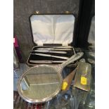 A small collection of silver items to include ladies hand mirror, tea knives, glass trinket box with