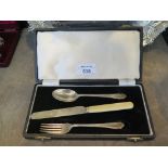A cased set of child's knife, fork and spoon