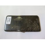 A silver Japanese cigarette case depicting Mount Fiji and pagodas, signed and marked sterling