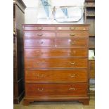 A chest of drawers by Brights of Nettlebed, the four short drawers over five graduated long