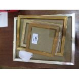 A collection of four silver plate photo frames