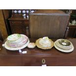 A Limoges tea cup, saucer and plate and other associated plates and saucers, including Minton,