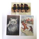 Three postcards,circa 1900, two Louis Wain and one other, all cats