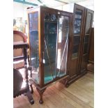 A stained beech glass display cabinet with sunburst glazing bars and cabriole legs 57cm wide