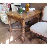 A oak drawleaf dining table, the square top on barley-twist legs joined by a cross stretcher 82.