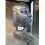 An ebony bust of a lady, possibly Kenyan 26cm high