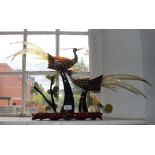 Two Asian exotic bird sculptures made of horn