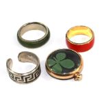 Three costume jewellery rings and a pendant