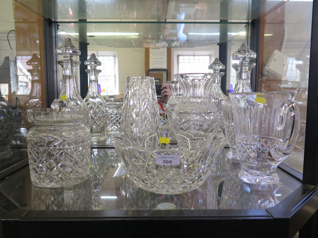 Waterford Crystal: Two decanters, two vases, a water jug, a bowl and a biscuit barrel, all with