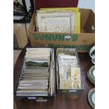 Four albums of early 20th century postcards and a quantity of loose postcards and greetings cards