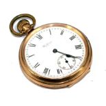 A gold plated open face Waltham pocket watch