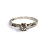 A platinum set single stone diamond ring