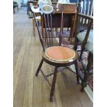 A Victorian turned beech bedroom chair with upholstered top rail and seat