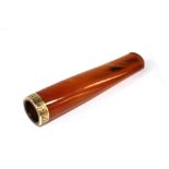 An amber and gold cigar holder